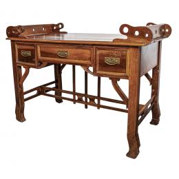631   -  <p><span class="object_title">Mesa de despacho modernista en madera de cerezo, ppios. del s.XX. </span>.<br></p>