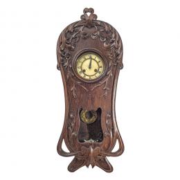 579   -  <p><span class="object_title">Reloj de pared modernista en madera de roble con decoración vegetal, ppios. del  s.XX. </span>.<br></p>