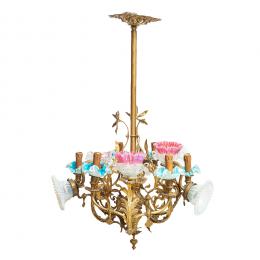 599   -  <p><span class="object_title">Lámpara de techo de doce luces en metal dorado con decoración floral y tulipas en cristal de diversas tonalidades, ppios. del s.XX. </span>.<br></p>