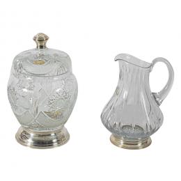 515   -  <p><span class="object_title">Lote de bombonera y jarra en cristal tallado con decoración geométrica, pomo y pies en plata española punzonada, fles. del s.XX.</span>.<br></p>
