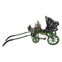 585   -  <p><span class="object_title">Carruaje infantil para pony en madera policromada, metal, tela y cuero, c.1930. </span>.<br></p>