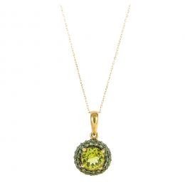 74   -  <p><span class="object_title">Colgante en oro y oro pavonado con amatista verde central talla redonda de 6 mm y orla de turmalinas talla brillante engastadas en garras. 2,84 gr. </span></p>