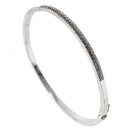 46   -  <p><span class="object_title">Pulsera esclava en oro blanco con doble banda de diamantes blancos y negros talla brillante, 0,60 ct aprox. 9 gr. </span></p>