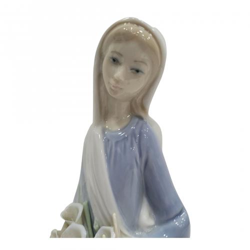 Meditando y Niña calas sentada. Lote de dos figuras en porc