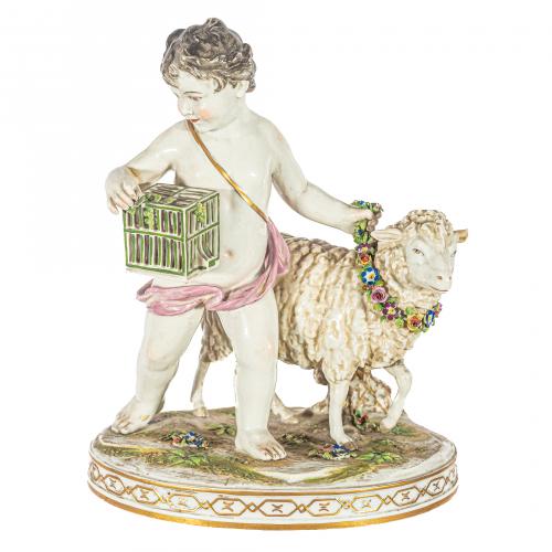 Amorcillo con jaula y oveja. Grupo en porcelana de Rudolsta