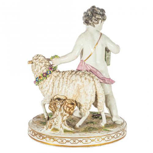 Amorcillo con jaula y oveja. Grupo en porcelana de Rudolsta