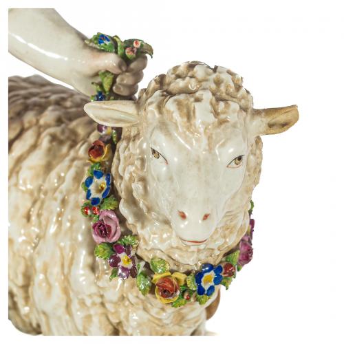 Amorcillo con jaula y oveja. Grupo en porcelana de Rudolsta
