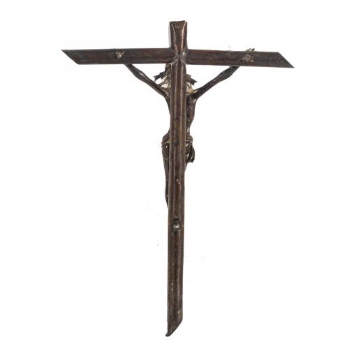 Lote de dos crucifijos en plata y madera ebonizada, s.XX. 