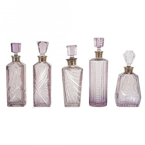 Lote de ocho botellas licoreras y una cubitera en cristal t