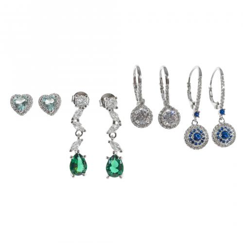 Lote de cuatro pares de pendientes en plata con símiles de 