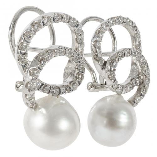 Pendientes en oro blanco con róleos de diamantes talla bril