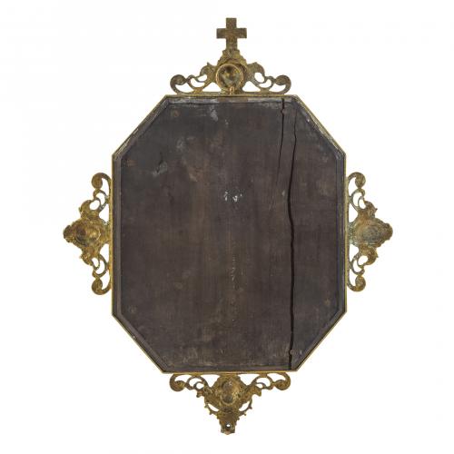 Placa con relieve en bronce dorado representando Virgen con